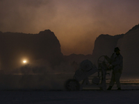 Labourers work at the ''White Mountain'' limestone extraction quarry site near Minya, Egypt, on December 14, 2024. Covered in fine white dus...