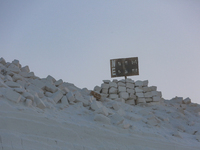 Labourers work at the ''White Mountain'' limestone extraction quarry site near Minya, Egypt, on December 14, 2024. Covered in fine white dus...