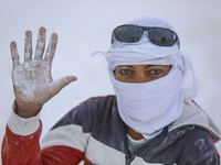 Labourers work at the ''White Mountain'' limestone extraction quarry site near Minya, Egypt, on December 14, 2024. Covered in fine white dus...