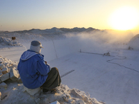 Labourers work at the ''White Mountain'' limestone extraction quarry site near Minya, Egypt, on December 14, 2024. Covered in fine white dus...