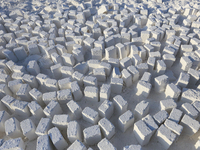 Labourers work at the ''White Mountain'' limestone extraction quarry site near Minya, Egypt, on December 14, 2024. Covered in fine white dus...