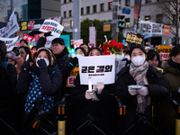 Citizens cheer after the impeachment of President Yoon Suk-yeol is passed in Seoul, South Korea, on December 14, 2024. Approximately 2 milli...