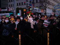 Citizens cheer after the impeachment of President Yoon Suk-yeol is passed in Seoul, South Korea, on December 14, 2024. Approximately 2 milli...