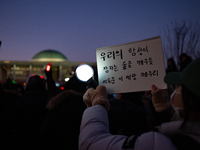 Citizens cheer after the impeachment of President Yoon Suk-yeol is passed in Seoul, South Korea, on December 14, 2024. Approximately 2 milli...