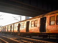 People travel on a Suburban Railway in Kolkata, India, on December 15, 2024. (