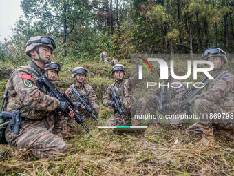 Armed police conduct an anti-terrorism drill in Guiyang, Guizhou province, China, on December 6, 2024. (