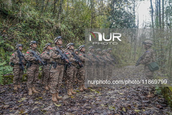 Armed police conduct an anti-terrorism drill in Guiyang, Guizhou province, China, on December 6, 2024. 