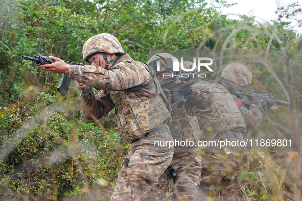 Armed police conduct an anti-terrorism drill in Guiyang, Guizhou province, China, on December 6, 2024. 