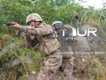 Armed police conduct an anti-terrorism drill in Guiyang, Guizhou province, China, on December 6, 2024. (