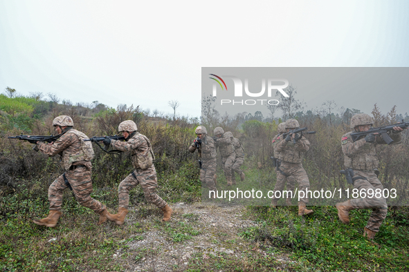 Armed police conduct an anti-terrorism drill in Guiyang, Guizhou province, China, on December 6, 2024. 