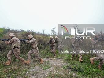 Armed police conduct an anti-terrorism drill in Guiyang, Guizhou province, China, on December 6, 2024. (