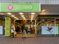 The 'Go Asia' supermarket in Augsburg, Bavaria, Germany, on December 14, 2024, stands out with its bright green signage and glass-panel entr...