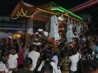 People attend a procession before the start of the Adams Peak (Sri Pada) season in Ratnapura, Sri Lanka, on December 13, 2024. The site is k...