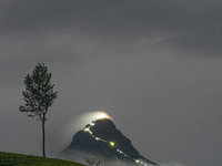 Lights illuminate the Adams Peak (Sri Pada) mountain during the season in Maskeliya, Sri Lanka, on December 14, 2024. It is well known for t...