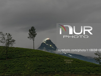 Lights illuminate the Adams Peak (Sri Pada) mountain during the season in Maskeliya, Sri Lanka, on December 14, 2024. It is well known for t...