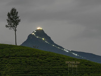 Lights illuminate the Adams Peak (Sri Pada) mountain during the season in Maskeliya, Sri Lanka, on December 14, 2024. It is well known for t...