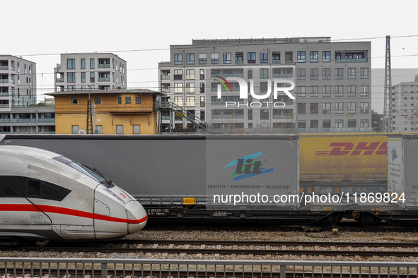 A Deutsche Bahn Intercity-Express (ICE) train passes through Munich Laim station in Bavaria, Germany, on December 14, 2024. The high-speed t...