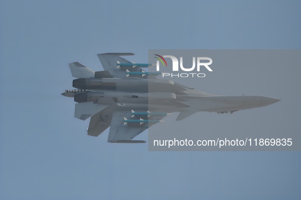 The Navy's J-15T carrier-based aircraft conducts a flight demonstration at the 2024 China Air Show in Zhuhai, Guangdong Province, China, on...