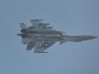 The Navy's J-15T carrier-based aircraft conducts a flight demonstration at the 2024 China Air Show in Zhuhai, Guangdong Province, China, on...