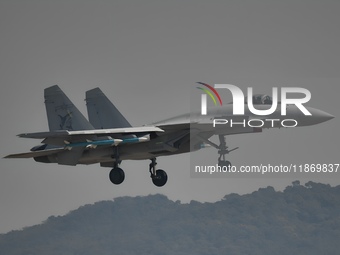 The Navy's J-15T carrier-based aircraft conducts a flight demonstration at the 2024 China Air Show in Zhuhai, Guangdong Province, China, on...