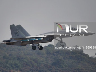 The Navy's J-15T carrier-based aircraft conducts a flight demonstration at the 2024 China Air Show in Zhuhai, Guangdong Province, China, on...