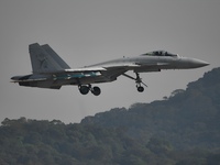 The Navy's J-15T carrier-based aircraft conducts a flight demonstration at the 2024 China Air Show in Zhuhai, Guangdong Province, China, on...