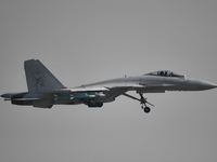 The Navy's J-15T carrier-based aircraft conducts a flight demonstration at the 2024 China Air Show in Zhuhai, Guangdong Province, China, on...