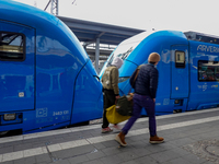 An Arverio train is stationed at Augsburg Central Station in Augsburg, Bavaria, Germany, on December 14, 2024, showcasing the vibrant blue d...