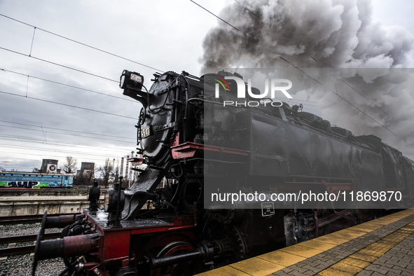 A steam locomotive, manufactured in Poland in 1931, is part of the Christmas attraction train of the Bulgarian State Railways at Central Rai...