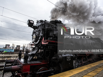 A steam locomotive, manufactured in Poland in 1931, is part of the Christmas attraction train of the Bulgarian State Railways at Central Rai...