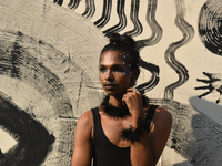 A participant attends the Rainbow Pride Walk, an event promoting gay, lesbian, bisexual, and transgender rights, in Kolkata, India, on Decem...