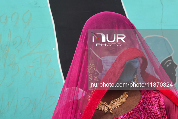 A participant attends the Rainbow Pride Walk, an event promoting gay, lesbian, bisexual, and transgender rights, in Kolkata, India, on Decem...