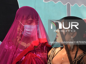 Participants attend the Rainbow Pride Walk, an event promoting gay, lesbian, bisexual, and transgender rights, in Kolkata, India, on Decembe...