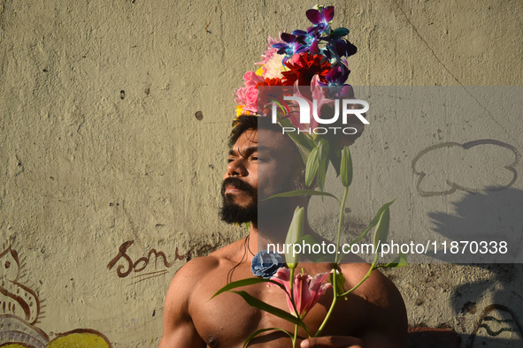 A participant attends the Rainbow Pride Walk, an event promoting gay, lesbian, bisexual, and transgender rights, in Kolkata, India, on Decem...