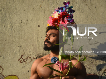 A participant attends the Rainbow Pride Walk, an event promoting gay, lesbian, bisexual, and transgender rights, in Kolkata, India, on Decem...