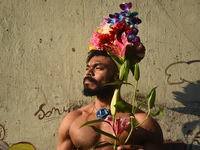 A participant attends the Rainbow Pride Walk, an event promoting gay, lesbian, bisexual, and transgender rights, in Kolkata, India, on Decem...