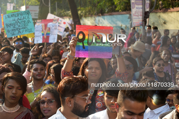 Participants attend the Rainbow Pride Walk, an event promoting gay, lesbian, bisexual, and transgender rights, in Kolkata, India, on Decembe...