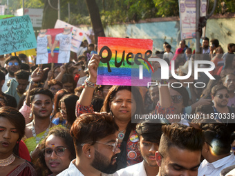 Participants attend the Rainbow Pride Walk, an event promoting gay, lesbian, bisexual, and transgender rights, in Kolkata, India, on Decembe...