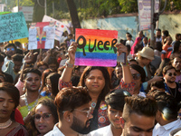 Participants attend the Rainbow Pride Walk, an event promoting gay, lesbian, bisexual, and transgender rights, in Kolkata, India, on Decembe...