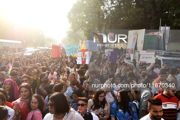 Participants attend the Rainbow Pride Walk, an event promoting gay, lesbian, bisexual, and transgender rights, in Kolkata, India, on Decembe...