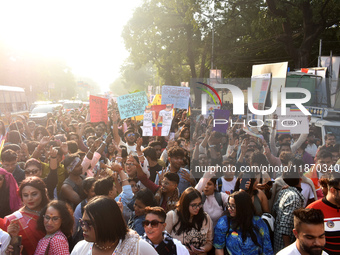 Participants attend the Rainbow Pride Walk, an event promoting gay, lesbian, bisexual, and transgender rights, in Kolkata, India, on Decembe...