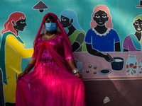 Participants from the LGBTQ+ community are seen dressed in various attire during the annual pride walk in Kolkata, India, on December 15, 20...