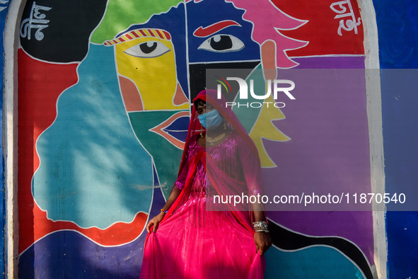 Participants from the LGBTQ+ community are seen dressed in various attire during the annual pride walk in Kolkata, India, on December 15, 20...