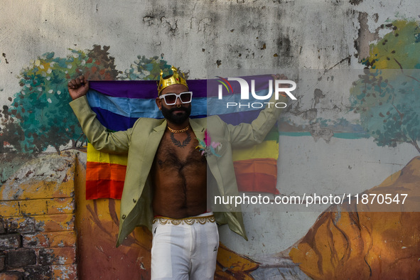 Participants from the LGBTQ+ community are seen dressed in various attire during the annual pride walk in Kolkata, India, on December 15, 20...