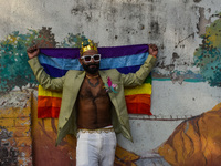 Participants from the LGBTQ+ community are seen dressed in various attire during the annual pride walk in Kolkata, India, on December 15, 20...