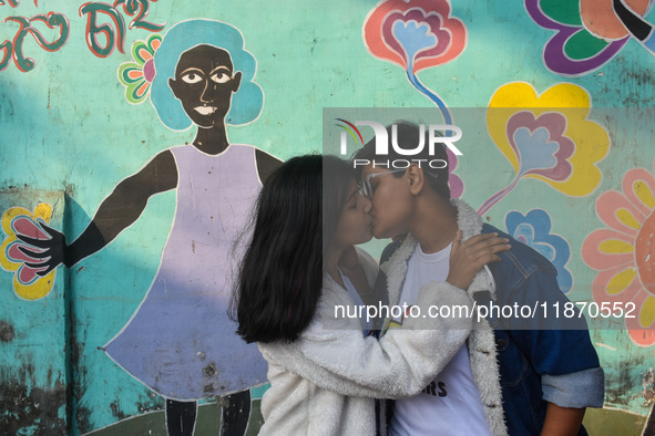 An LGBTQ+ couple kisses during the annual pride walk in Kolkata, India, on December 15, 2024. 