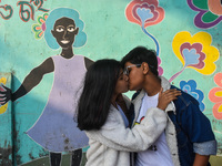 An LGBTQ+ couple kisses during the annual pride walk in Kolkata, India, on December 15, 2024. (