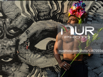 Participants from the LGBTQ+ community are seen dressed in various attire during the annual pride walk in Kolkata, India, on December 15, 20...