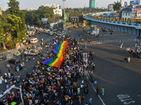 A giant pride flag is seen during the annual Pride walk in Kolkata, India, on December 15, 2024. (