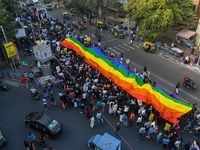 A giant pride flag is seen during the annual Pride walk in Kolkata, India, on December 15, 2024. (